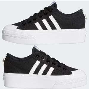 Women’s black Adidas platform sneakers size 7